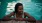 a woman in a pool